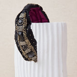 Embroidered headband with turquoise crystals and resin
