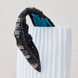 Embroidered headband with turquoise crystals and resin