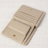 Cartera Monedero Trenzado Beige