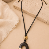 Collar largo de asta con colgante circular